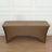 Brown stretch table cover for events and gatherings.