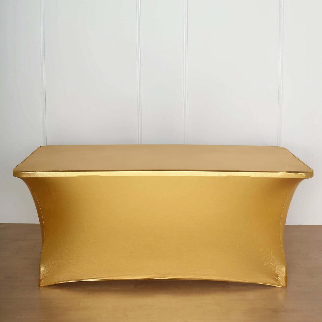 Gold table cover with elegant design and smooth finish.