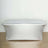 Silver table cover draped over a rectangular table.