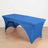 Blue fitted table cover on a folding table.