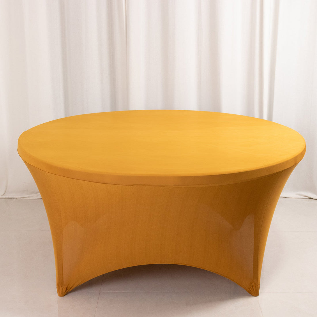 Yellow round table with a sleek design on a plain backdrop.