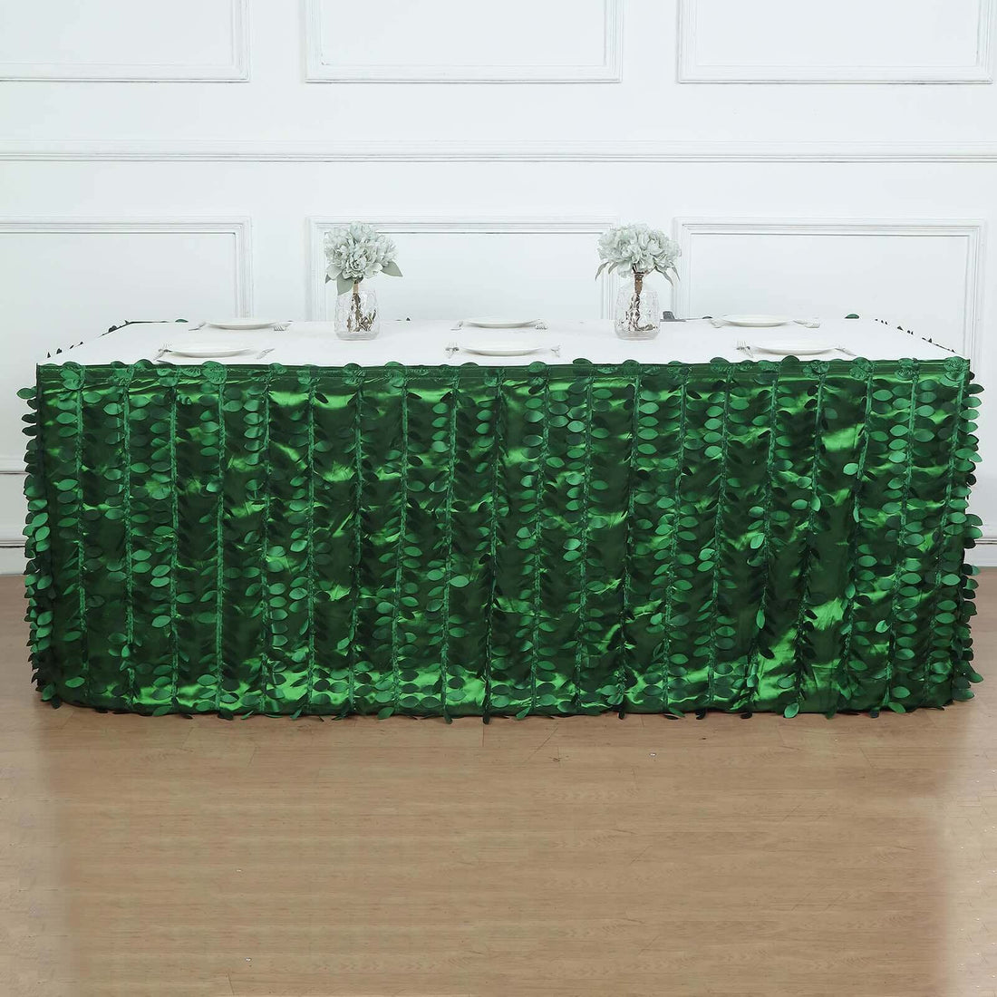 Green leaf table skirt for events and parties.