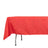 Red tablecloth draped over a table, showcasing vibrant color and texture.