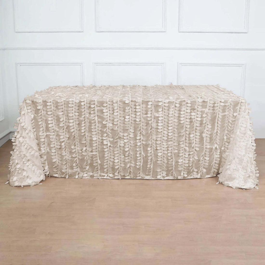 Cream ruffled tablecloth draped elegantly over a table.