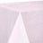 Pink textured tablecloth draped over a corner