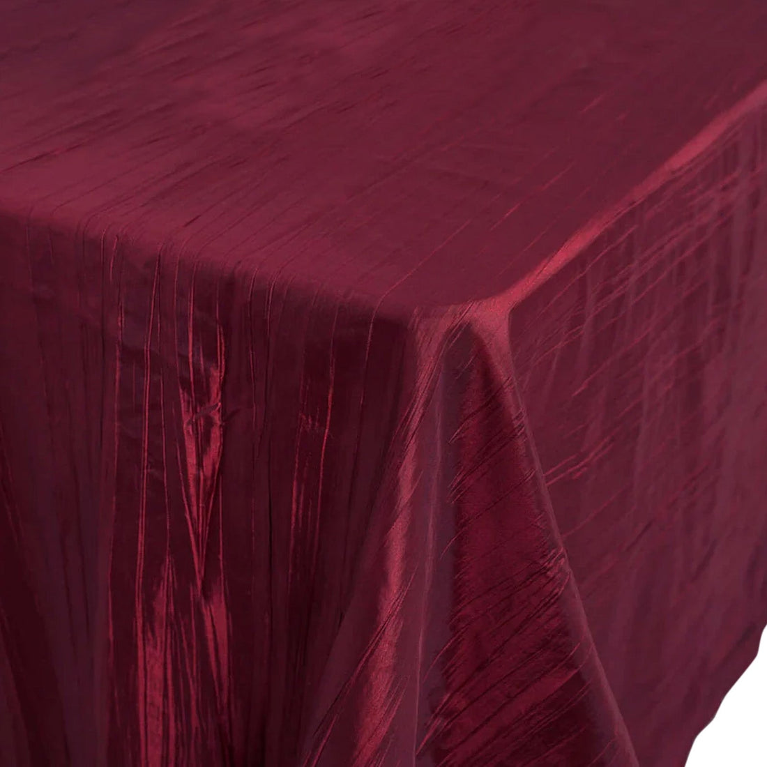Burgundy tablecloth with a textured finish on a plain background