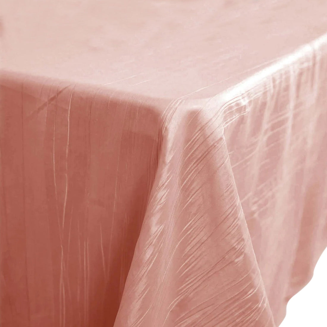 Pink tablecloth with a smooth, textured finish.