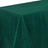 Green velvet tablecloth with elegant draping.