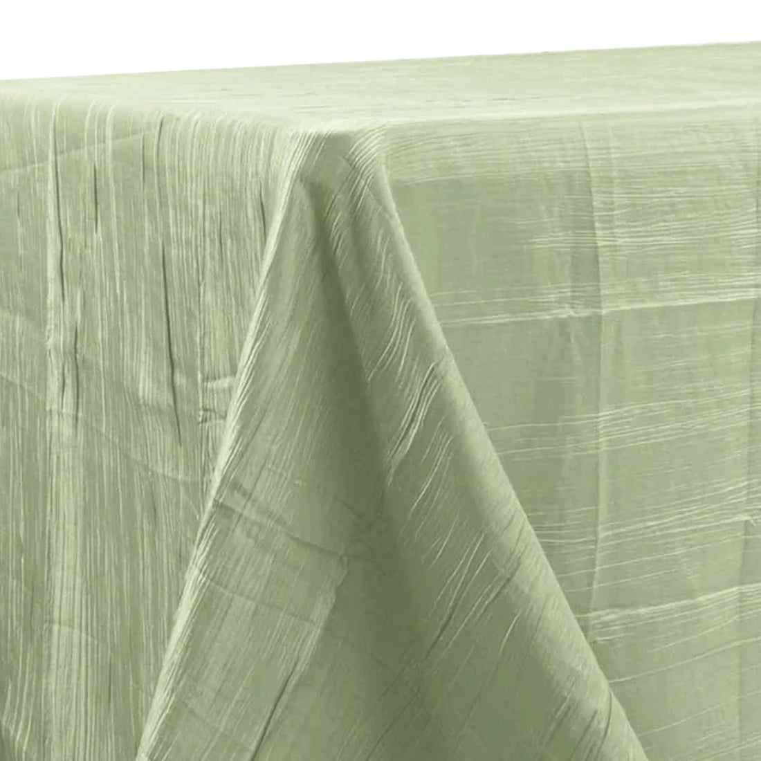 Green textured tablecloth draped elegantly on a table