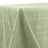 Green textured tablecloth draped elegantly on a table