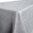 Silver crinkled tablecloth on a table edge