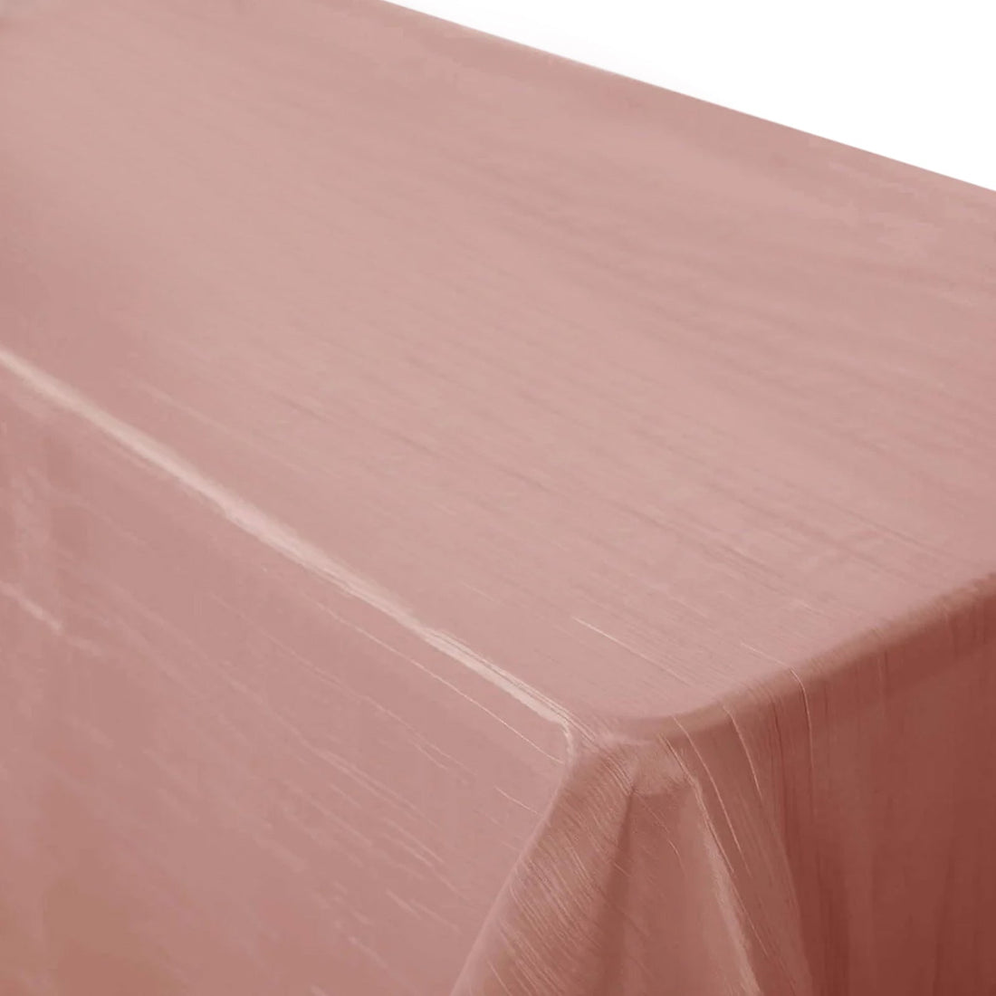 Pink tablecloth draped over a table, showcasing its smooth texture.