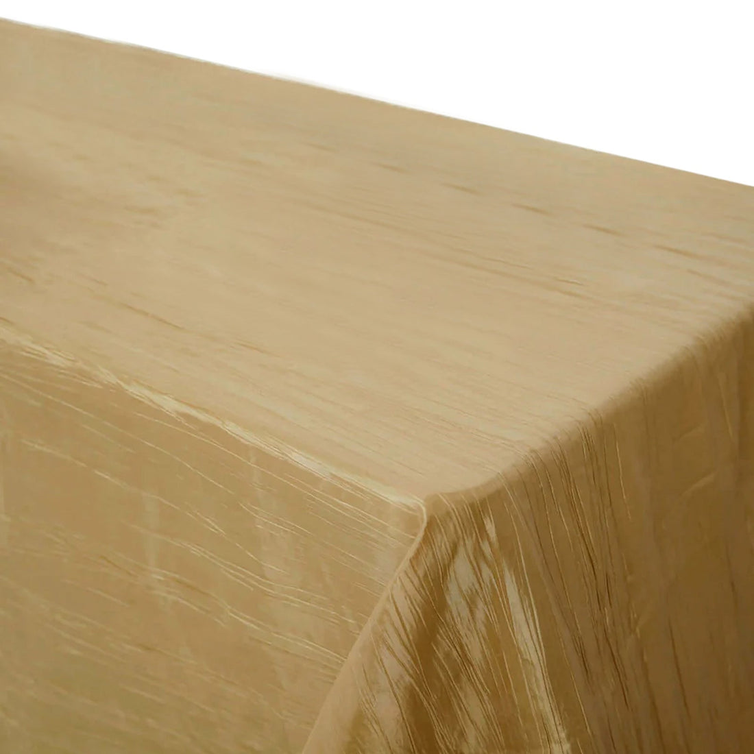 Gold tablecloth with a glossy finish on a plain background.