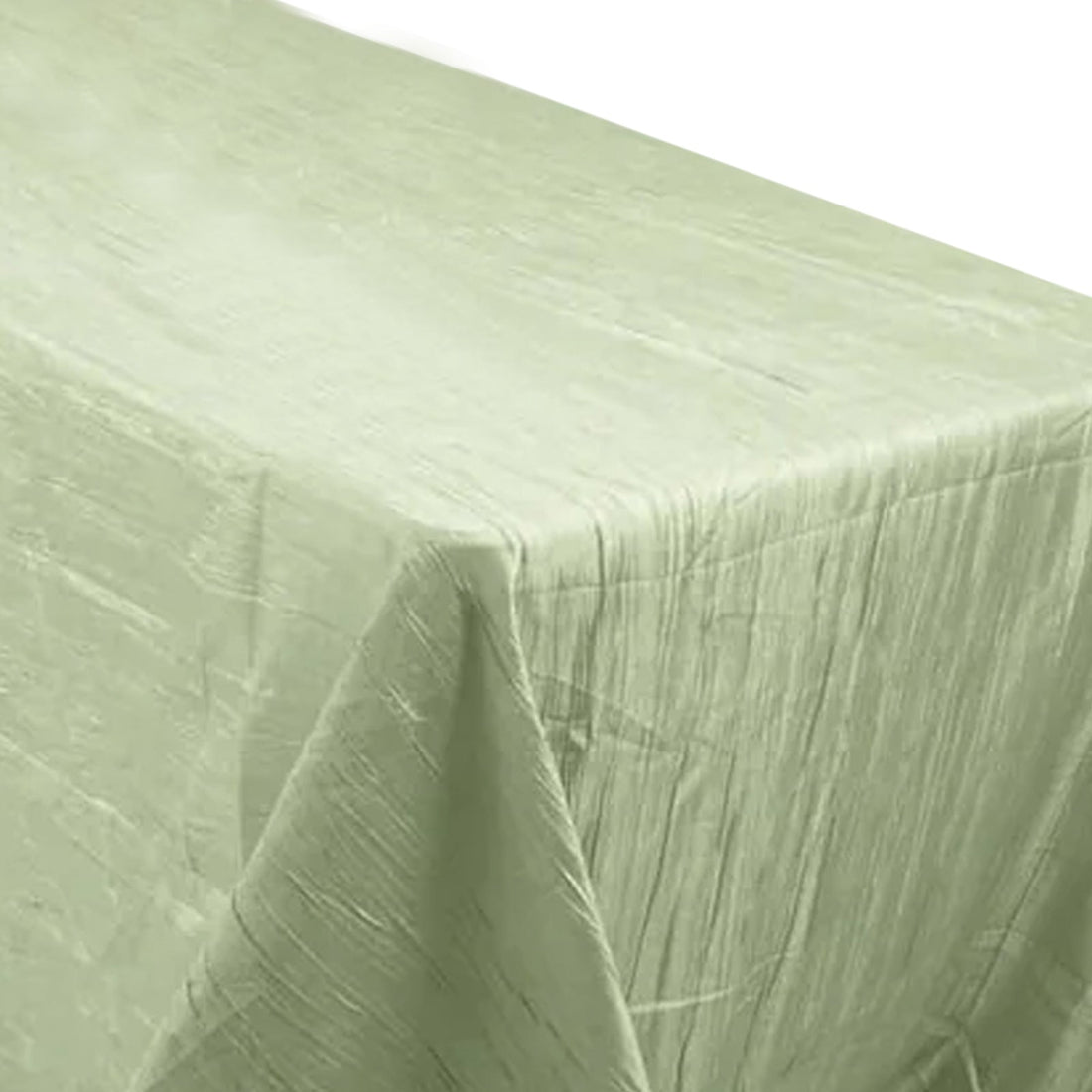 Light green textured tablecloth on a plain background