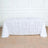 White tablecloth with textured design on a table.