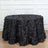 Black leaf-patterned tablecloth on a round table