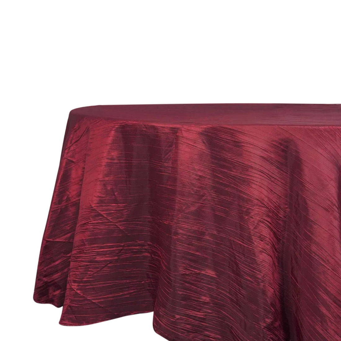 Red tablecloth with textured fabric draping elegantly.
