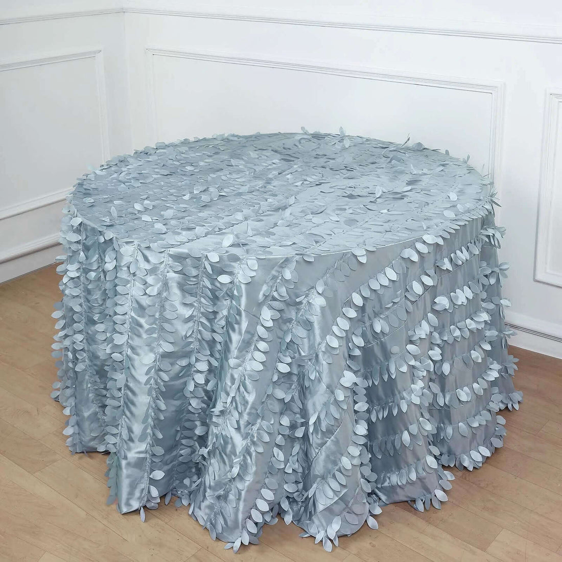 Round tablecloth with leaf design in soft blue fabric