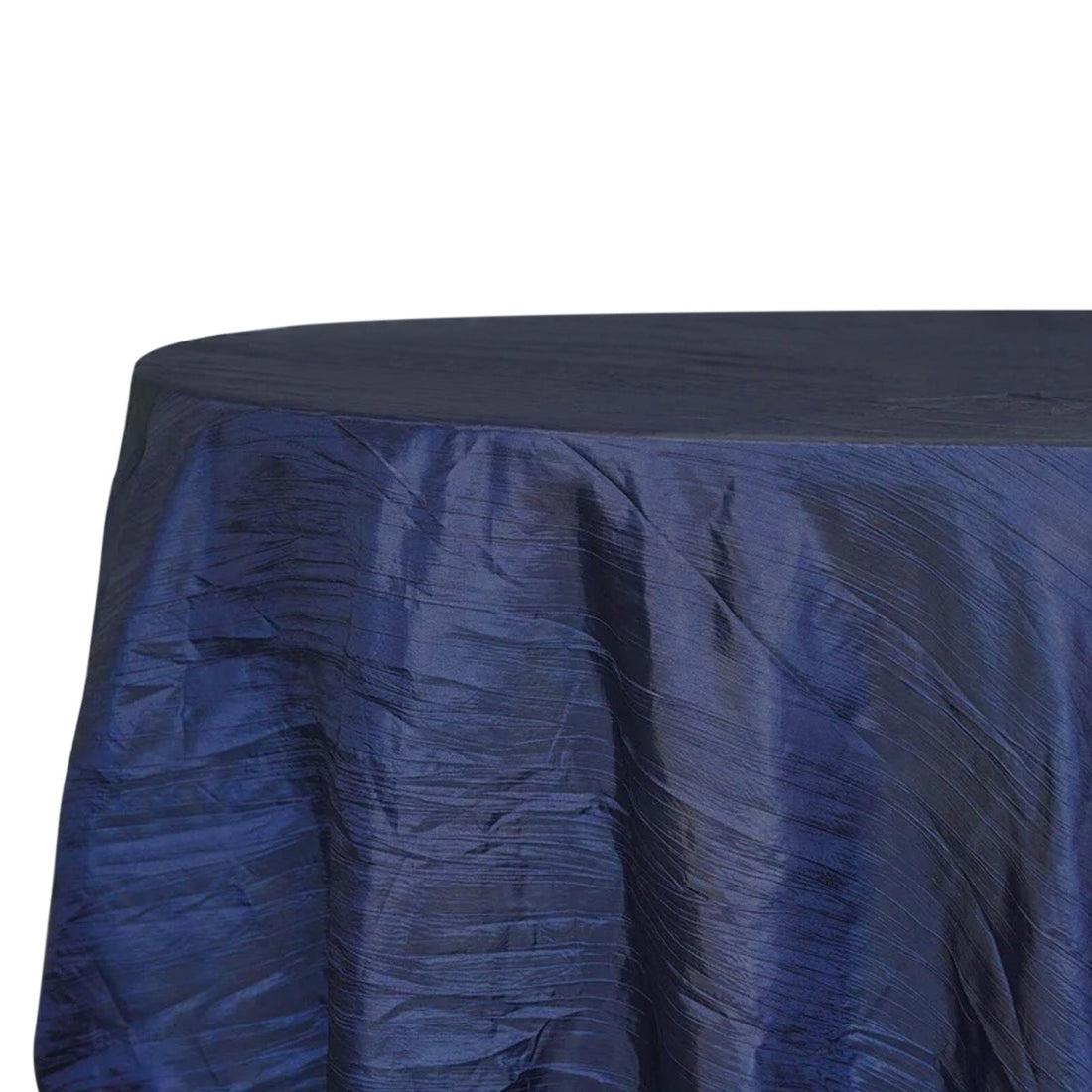Navy blue tablecloth with textured fabric on a plain backdrop