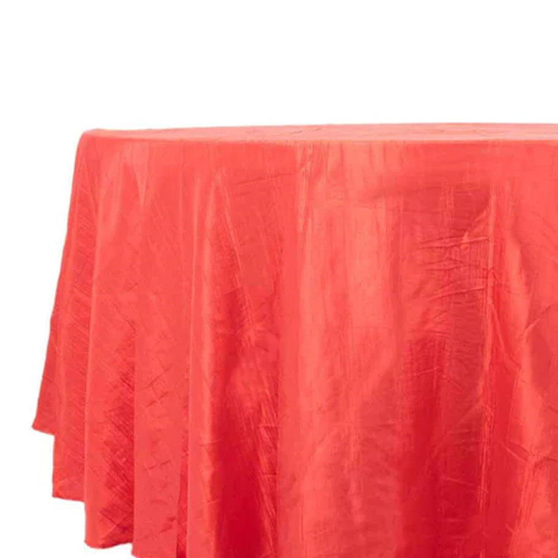 Red tablecloth draped elegantly over a round table.