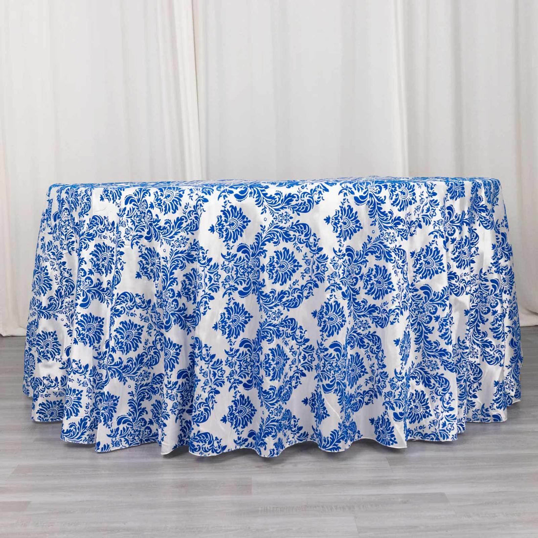 Blue floral patterned tablecloth for events and gatherings.