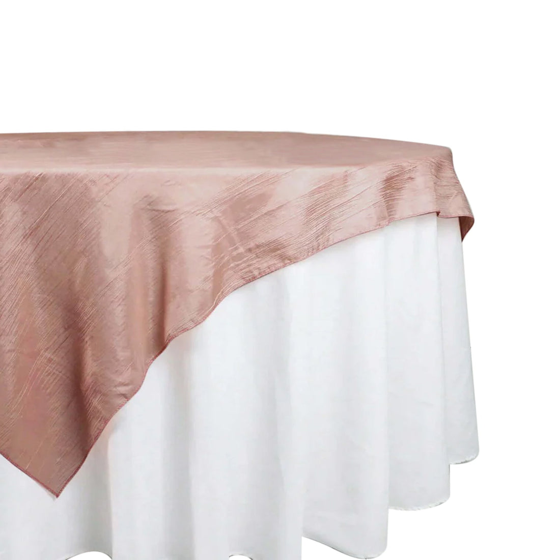 Rose satin tablecloth draped elegantly over a white table. 
