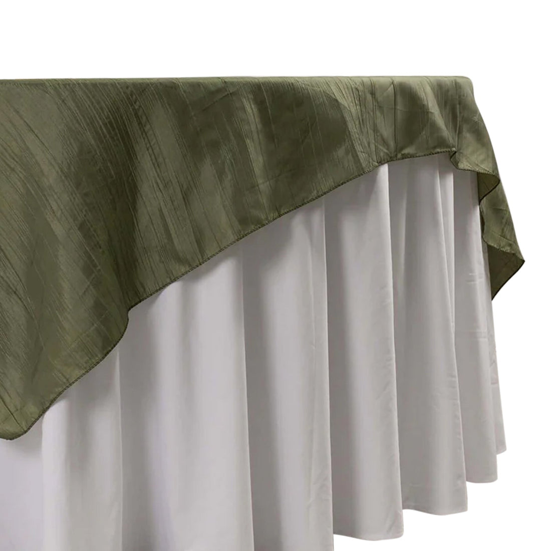 Olive green tablecloth with white underlayer, elegantly draped. 