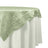 Light green tablecloth draped elegantly over a white table. 
