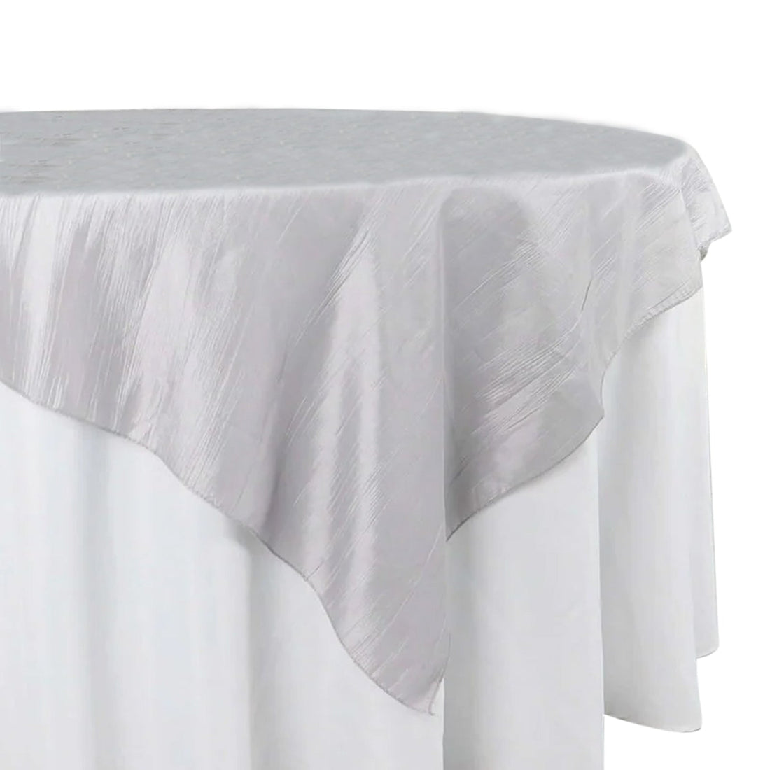 Silver satin tablecloth draped elegantly over a round table 