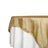 Gold tablecloth with a textured finish draped over a white table 