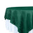 Green tablecloth draped elegantly over a round table 