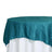 Teal round tablecloth on a white table 