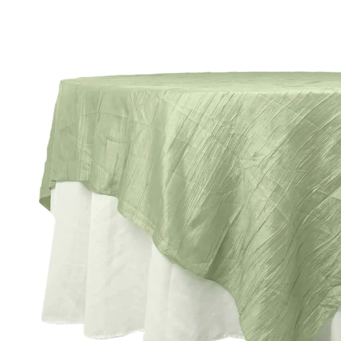 Green textured tablecloth draped elegantly over a white table. 