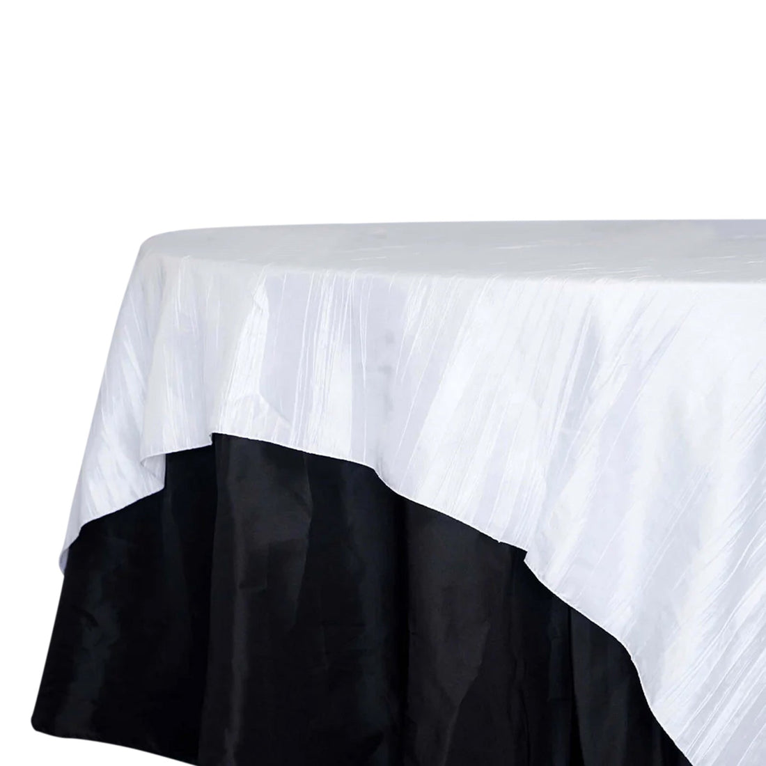 White and black tablecloth with a textured design. 