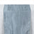 Silver textured table runner on a light background.