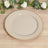 Beige plate with gold beaded rim on wooden surface.