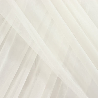 Sheer white fabric draped in soft folds for elegant decor. #whtbkgd