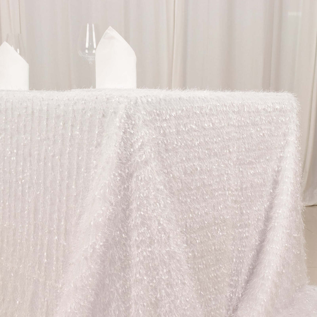 Textured white tablecloth with a soft, fluffy finish.