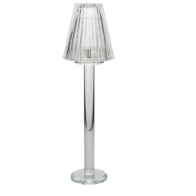 Clear glass table lamp with pleated shade, elegant design.