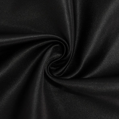 Black satin fabric swirl texture close-up shot. #whtbkgd