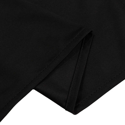 Black fabric folded neatly, showcasing smooth texture and stitching details.