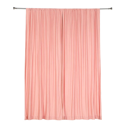 Pink curtain panel with pleated design, perfect for home decor.