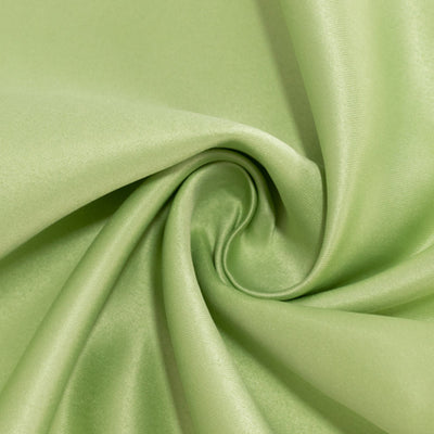 Soft green satin fabric in a swirling pattern. #whtbkgd