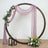 Decorative circular backdrop with draped fabric and flowers for events or photography.