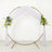 Gold circular wedding arch with white drapes and floral arrangements