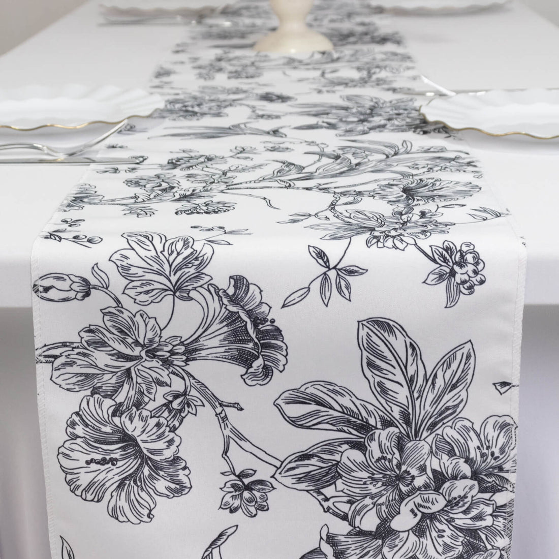 Floral-patterned table runner on a dining table.