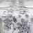 Floral-patterned table runner on a dining table.