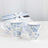 Blue floral patterned mugs with a decorative gift box.