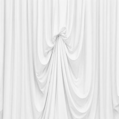 White draped curtain fabric with soft folds and elegant abstract texture