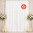 White flame retardant curtain backdrop with floral stands and candles